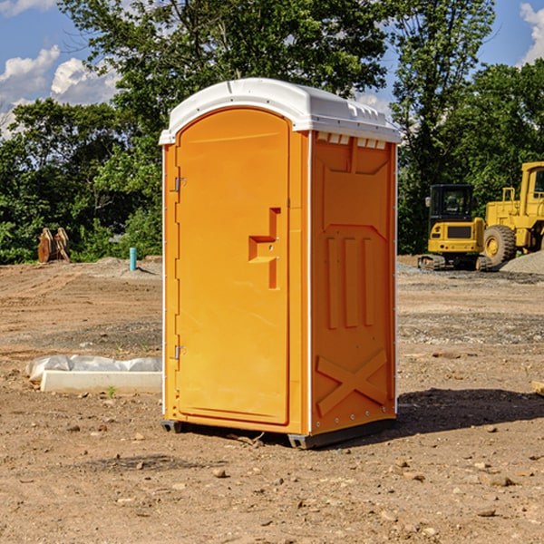 how often are the portable restrooms cleaned and serviced during a rental period in Placida